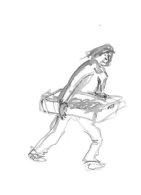 figure carrying a box
