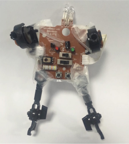 Figure built from an old motherboard and other parts of electronic devices.