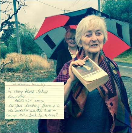 Image of a participant sharing the collection of Gertrude Stein’s writing that she carried on the Walking Library for Women Walking walk in Geelong (Australia), 16 November 2017