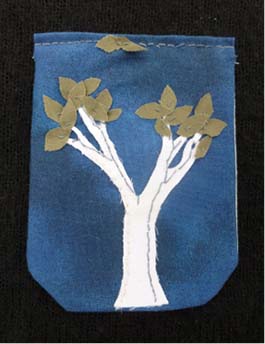 Image of blue pocket with tree motif