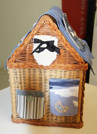 Image of wicker hut with pockets on it.