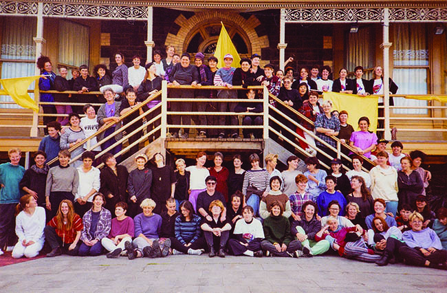 Group photo of Women's Circus members in front of the Footscray Community Arts Centre.
